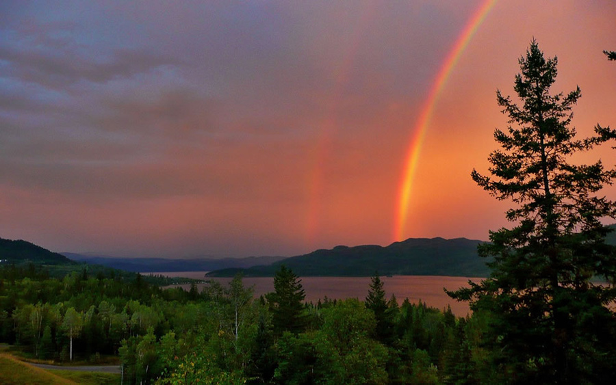 Red Thunderstorm Rainbow over Canim Lake. Life isn’t about waiting for the storm to pass; it’s learning to dance in the rain. Photo #24 by Brigitte Werner