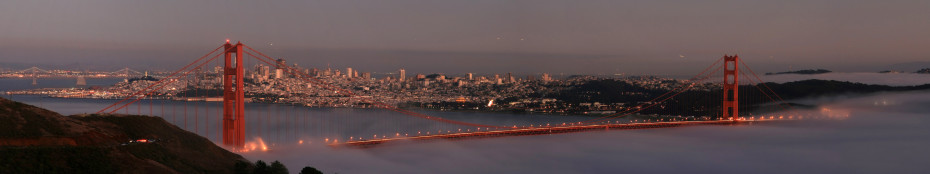 San_Francisco_with_two_bridges_and_the_low_fog_-930x174