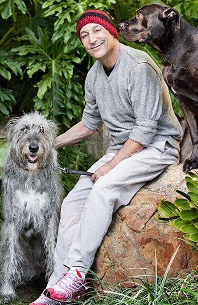Animal lover ... Sam Simon, pictured with his two dogs, is battling terminal colon cancer. Picture: Twitter