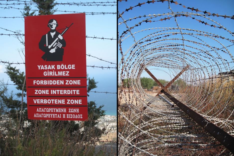 Gun-in-hand-warning-sign-for-forbidden-zone-and-barbed-wire-from-accessible-area-of-Famagusta